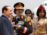 Ливийский лидер Муаммар Каддафи впервые прибыл с официальным визитом в Италию. Местная пресса уже назвала этот визит историческим