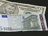 Доллар подешевел на 1,5 копейки, евро упал на 27 