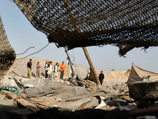 Израильская авиация атаковала в воскресенье туннели палестинских контрабандистов на границе сектора Газа с Египтом, ранив трех человек