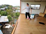 По меньшей мере два человека погибли и свыше 50 получили ранения в Японии в результате удара мощного тайфуна "Мелор"