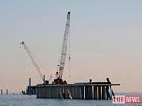 "Базэл" участвует в строительстве грузового порта близ реки Мзымта, который предназначен для снабжения строительными грузами будущих объектов Зимних Олимпийских игр 2014 года. Торжественное открытие порта не состоялось из-за шторма, смывшего часть констру "Базэл" участвует в строительстве грузового порта близ реки Мзымта, который предназначен для снабжения строительными грузами будущих объектов Зимних Олимпийских игр 2014 года. Торжественное открытие порта не состоялось из-за шторма, смывшего часть констру