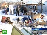 Трактор снес баррикады, возведенные жителями в поселке Речник Трактор снес баррикады, возведенные жителями в поселке Речник