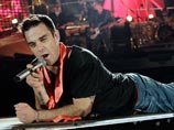 Ради гаитян Робби Уильямс споет со своей бывшей группой Take That Ради гаитян Робби Уильямс споет со своей бывшей группой Take That
