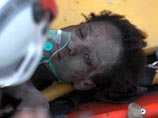 На Гаити девушка 15 дней дожидалась спасения под руинами. Число погибших достигло 170 тысяч На Гаити девушка 15 дней дожидалась спасения под руинами. Число погибших достигло 170 тысяч