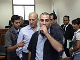 Первый израильский премьер, оказавшийся на скамье подсудимых, настаивает на своей невиновности и рассчитывает доказать это в ходе процесса
