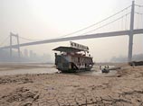 Сильная песчано-пылевая буря, бушевавшая в субботу на северо-западе Китая, перенеслась на территорию Японии