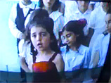 В распоряжение журналистов "Московского комсомольца" попала видеозапись, на которой террористка Джанет Абдулева, взорвавшая себя 29 марта на "Парке культуры", участвует в детском утреннике "Прощай, начальная школа"