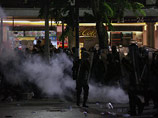 Столкновения полиции и оппозиции в Бангкоке привели к жертвам - восемь погибших