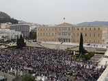 Парламент Греции одобрил экономию расходов в обмен на кредиты. Народ встретил это умеренными беспорядками