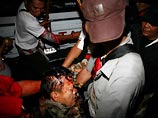 Военный советник таиландской оппозиции - опальный генерал-майор Катия Савасдипол получил огнестрельное ранение в голову в центре Бангкока