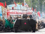 Лидеры тайской оппозиции в Бангкоке официально объявили о прекращении антиправительственных акций протеста. Как передает AP, "краснорубашечники" заявили, что решили сдаться властям, чтобы избежать дальнейшего кровопролития