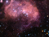 Космический телескоп Hubble сделал снимок региона LHA 120-N 11 в Большом Магеллановом облаке, где в "сахарной вате" из облаков светящегося газа идет процесс активного звездообразования