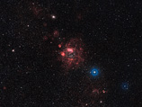 LHA 120-N 11, который астрономы также называют просто N11, - регион протяженностью около тысячи световых лет в Большом Магеллановом облаке, расположенном по соседству с нашей галактикой