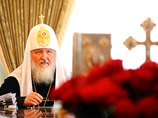 "НГ" назвала визит Патриарха на Украину "аномально жарким"