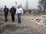 Путин поручил губернаторам восстановить сгоревшее жилье до конца октября