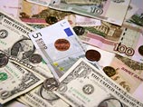Доллар потерял еще 17 копеек, евро упал на 8