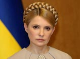 Тимошенко призвала к перевыборам, сравнила Януковича с Калигулой и ядерным оружием, а КС обвинила в бешенстве