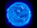 Российские ученые разглядели на Солнце гигантский смайлик (ФОТО)