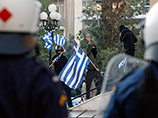 В Афинах неизвестные подожгли банк, бюро правящей партии и офис строительной компании
