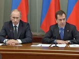 Путин и Медведев разрешили "ЕдРу" использовать свои портреты в предвыборной кампании