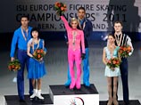 Российские фигуристы Александр Смирнов и Юко Кавагути получили серебряные медали чемпионата Европы по фигурному катанию, проходящего в швейцарском Бернет