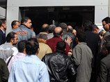 Второй день подряд в Египте наблюдается большой наплыв клиентов в отделениях частных и государственных банков, которые открылись в воскресенье после долгого перерыва