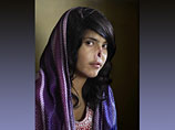 Главный приз World Press Photo получил снимок афганской девушки, которой муж-талиб отрезал нос и уши