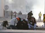 Полиция Бахрейна атаковала лагерь спящих демонстрантов, применив слезоточивый газ Полиция Бахрейна атаковала лагерь спящих демонстрантов, применив слезоточивый газ