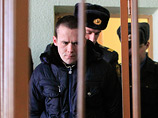 На скамье подсудимых - активист предвыборного штаба оппозиционного экс-кандидата в президенты Владимира Некляева. Василий Парфенков был задержан 4 января и с тех пор находится под стражей. 