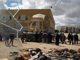 Новые города переходят под власть ливийских повстанцев. Каддафи строит "стальную стену" вокруг Триполи