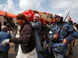 Ливийские повстанцы нашли тела жертв Каддафи: убивали военных, не желавших стрелять по людям