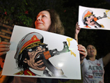 Едкие карикатуры на полковника Муамара Каддафи стали мощным агитационным оружием для бунтовщиков, захвативших восточную часть Ливии
