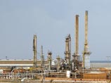 Повстанцы в Ливии отбили у войск Каддафи центр нефтяной промышленности  - город Брега