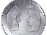 Отчеканена 5-фунтовая монета по случаю свадьбы принца Уильяма и Кейт Миддлтон