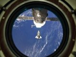 NASA продлило еще на день срок пребывания в космосе шаттла Discovery