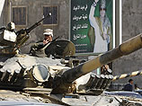 Войска Каддафи отбили у повстанцев три города