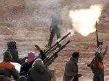 Ливийские повстанцы сбили вертолет войск Каддафи Ливийские повстанцы сбили вертолет войск Каддафи