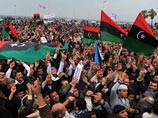 В Ливии сторонники Каддафи развивают наступление, обвиняя оппозицию в использовании "живых щитов"