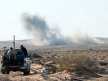 Под натиском ливийских правительственных сил бунтовщики покидают стратегически важный нефтяной порт города Рас-Лануф, расположенный к востоку от столицы страны Триполи
