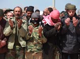Войска Каддафи теснят повстанцев в Рас-Лануфе. У диктатора нашлось "тайное оружие" Войска Каддафи теснят повстанцев в Рас-Лануфе. У диктатора нашлось "тайное оружие"