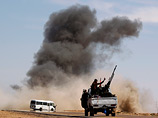 Армия Каддафи обстреливает Адждабию и готовится к штурму центра повстанцев - Бенгази