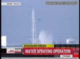 Вертолеты сил самообороны Японии завершили сброс воды на третий реактор АЭС "Фукусима-1" и вернулись на базу