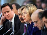 Участники Лондонской конференции по Ливии договорились ужесточать санкции и послать к Каддафи гонца 