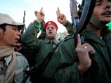Двадцатитысячной армии Каддафи противостоит тысяча имеющих военную выучку повстанцев Двадцатитысячной армии Каддафи противостоит тысяча имеющих военную выучку повстанцев