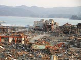 Число жертв чудовищного землетрясения и цунами в Японии продолжает расти