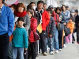 Очередь в супермаркет в городе Ошу, префектура Ивате, 8 апреля 2011 года Очередь в супермаркет в городе Ошу, префектура Ивате, 8 апреля 2011 года
