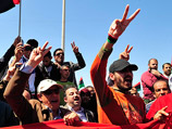 Каддафи назвал условия перемирия: отправить его в отставку с почетом и передать власть сыну 