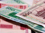 Правительство и Нацбанк Белоруссии договорились легализовать "теневой" обменный курс белорусского рубля, который сложился в условиях дефицита иностранной валюты