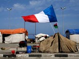Англия и Франция отправляют военных в Ливию. Режим Каддафи просит не бомбить - он даже согласен на выборы