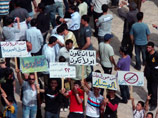 Тысячи людей принимают участие в антиправительственных демонстрациях в городах Сирии